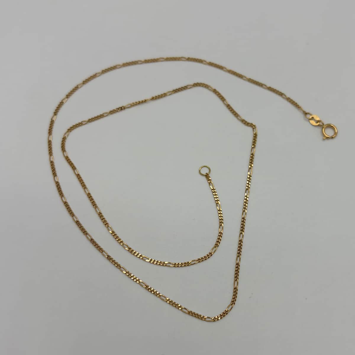 زنجیر طلا 18 عیار فیگارو ۴۴ سانت وزن 2.060 گرم اجرت ساخت 10 درصد کد GD01 000335