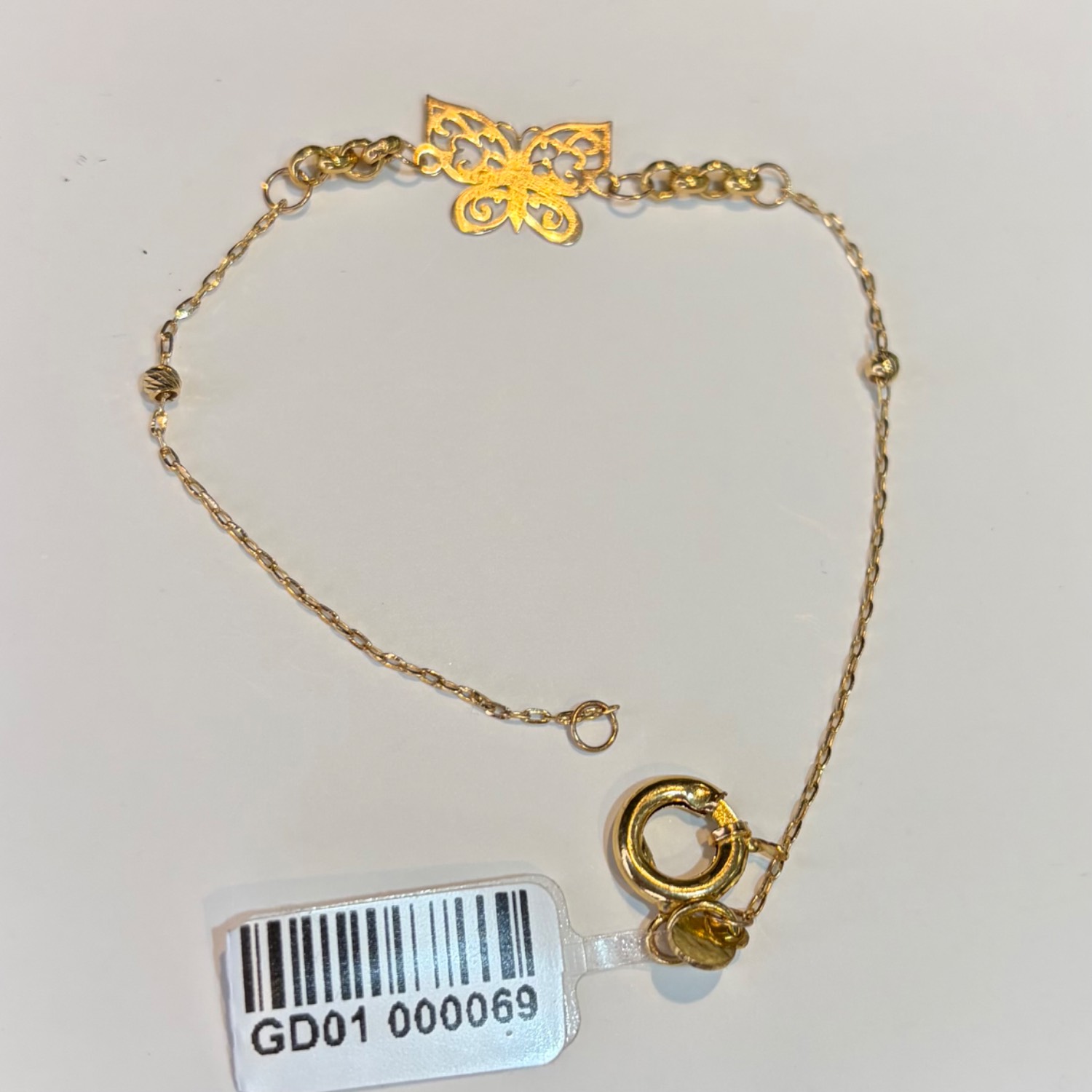 دستبند طلا ۱۸ عیار مینیمال پروانه وزن ۱٫۴۹۰ گرم اجرت ساخت ۱۲.۵ درصد کد GD01 000069